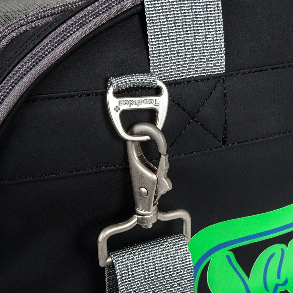 Black dog carrier close-up with metal D-ring clip and gray shoulder strap