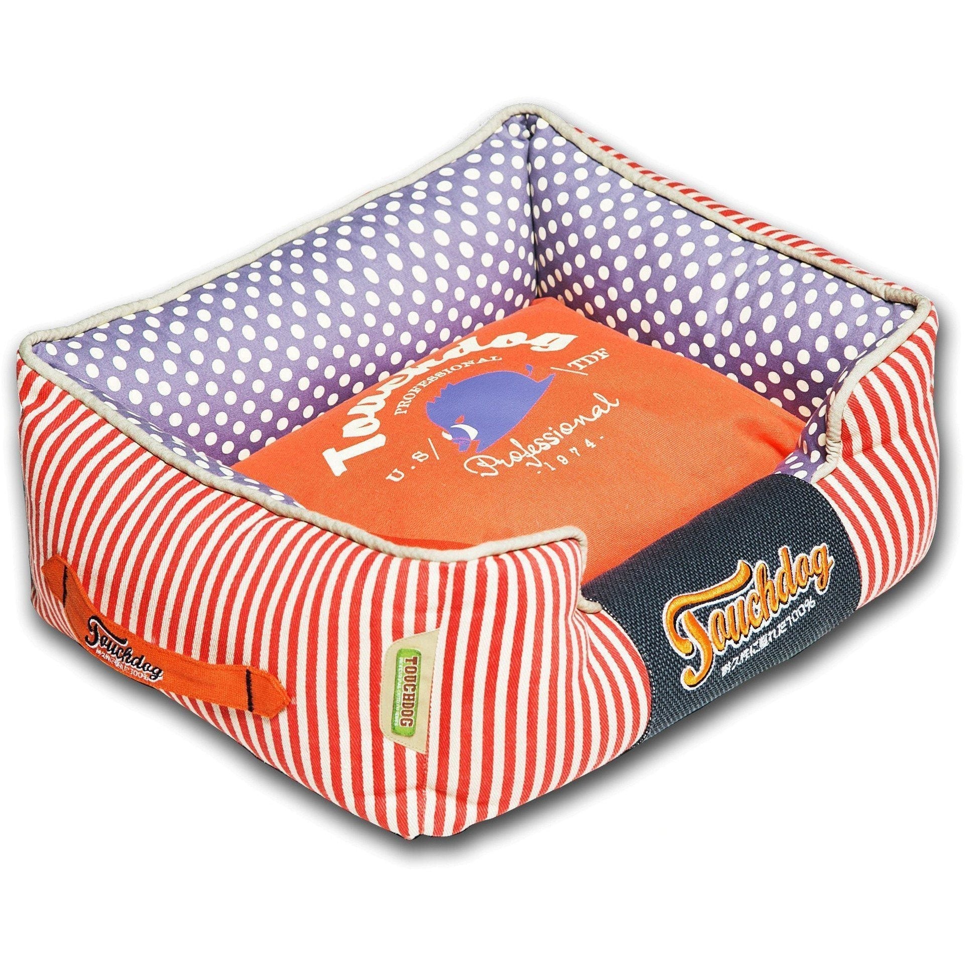 Rectangular dog bed with orange inner cushion, purple polka dots, and red-and-white stripes