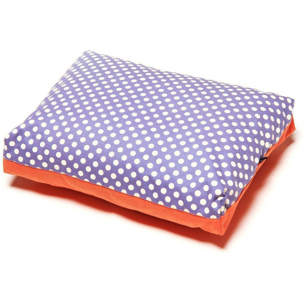 Purple polka-dot rectangular dog bed cushion with orange base border