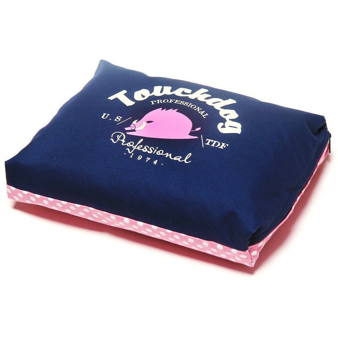 Navy rectangular dog bed cushion with pink polka-dot trim and Touchdog logo