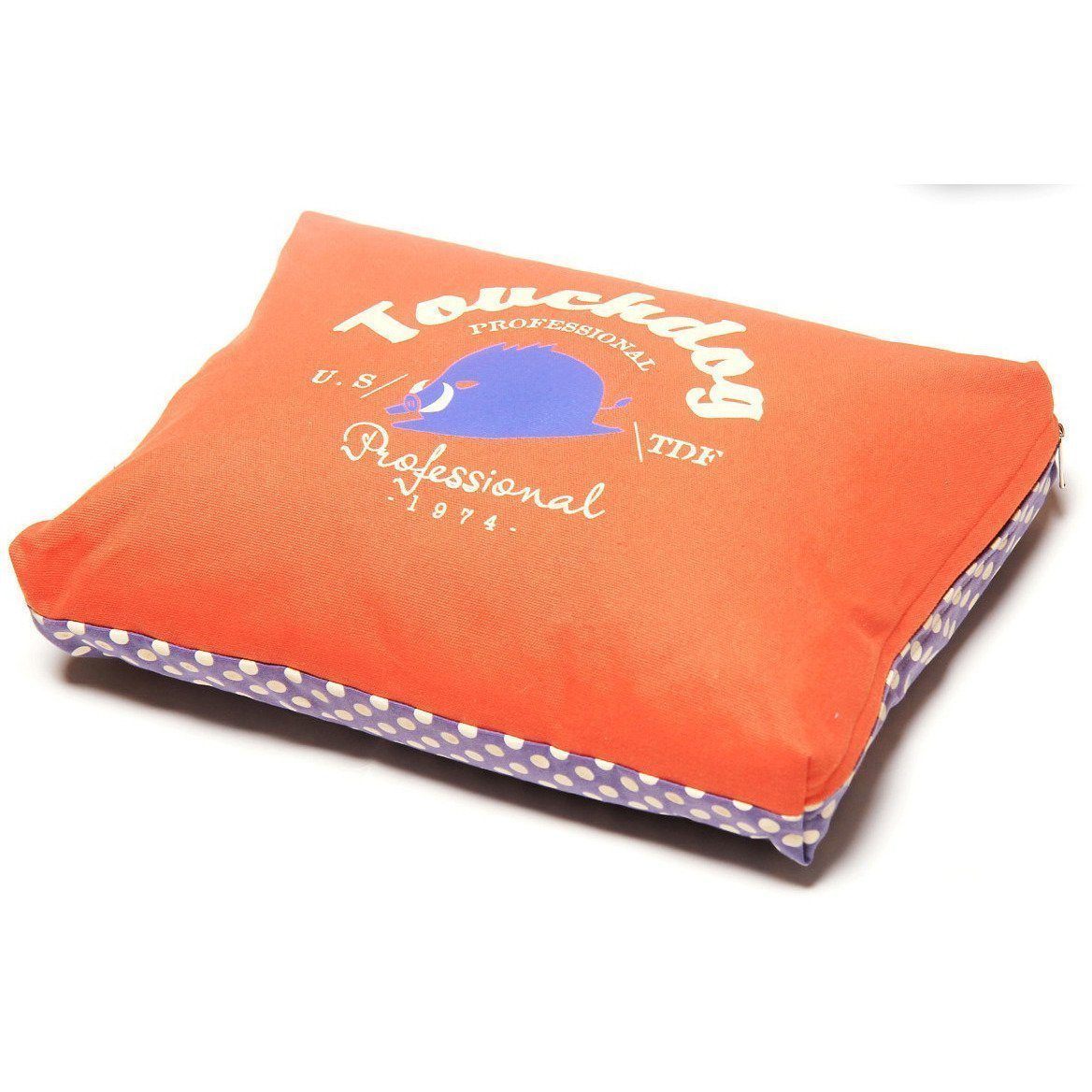 Orange rectangular dog bed cushion with purple polka-dot base lining
