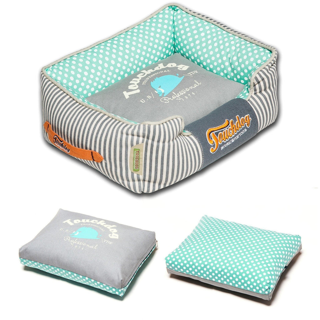 Rectangular dog bed with gray cushion, teal polka-dot lining, and striped sides
