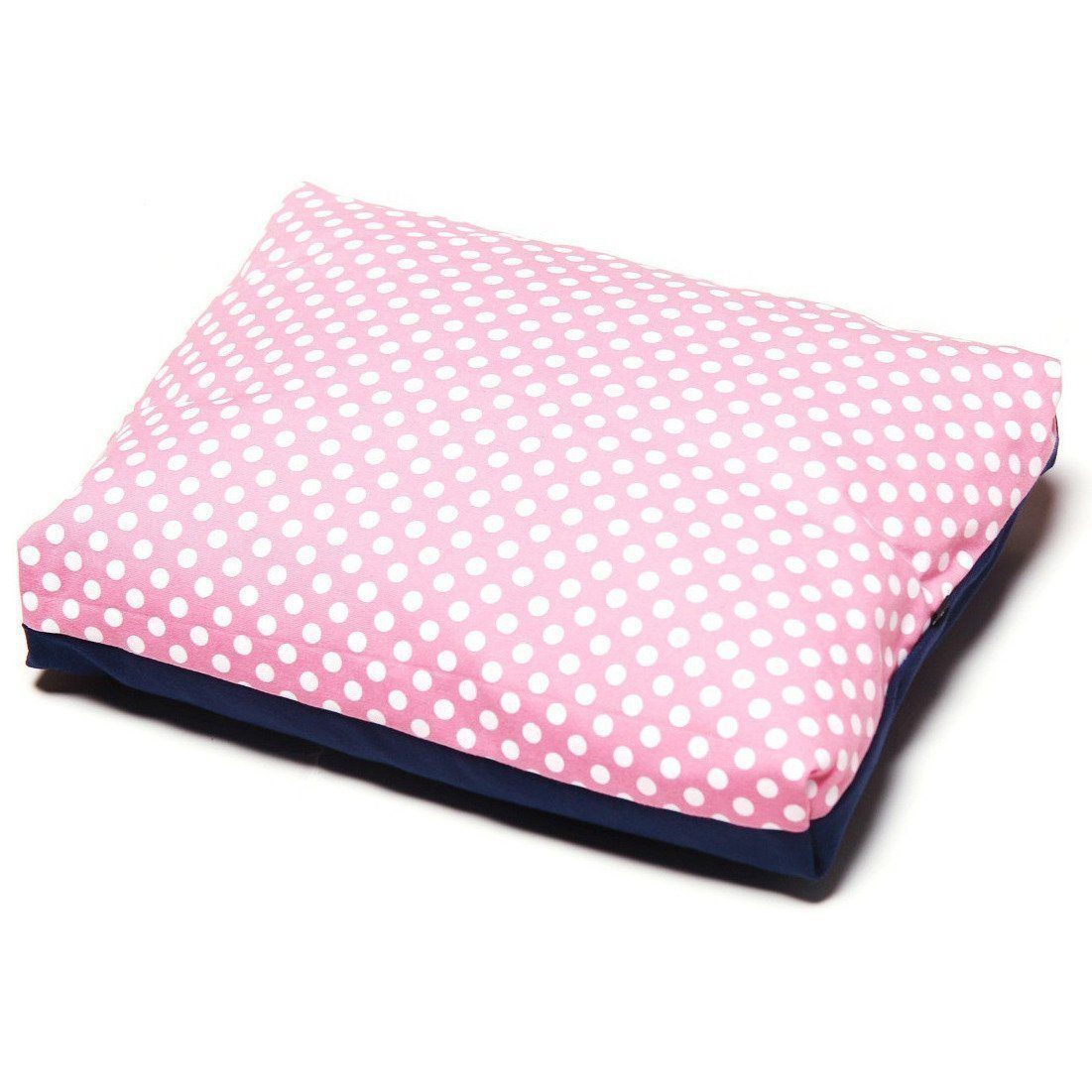Pink polka-dot rectangular dog bed cushion with dark blue trim