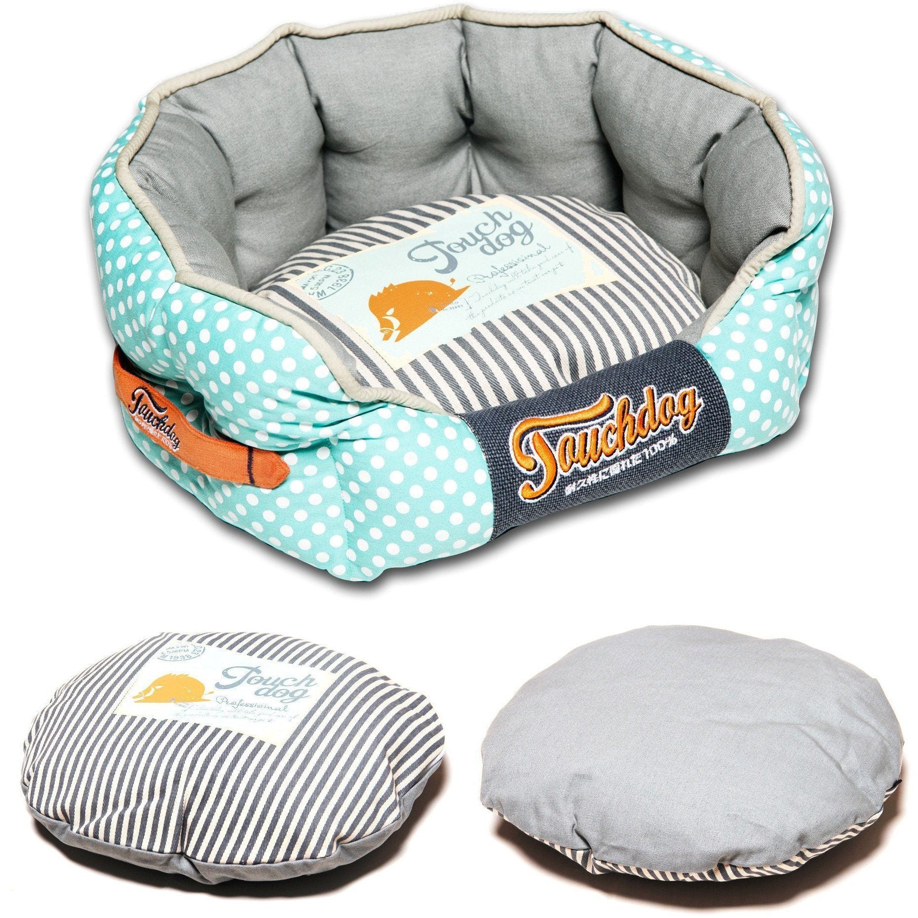 Polka-dot rounded dog bed with turquoise sides, gray interior, navy logo band, striped pad
