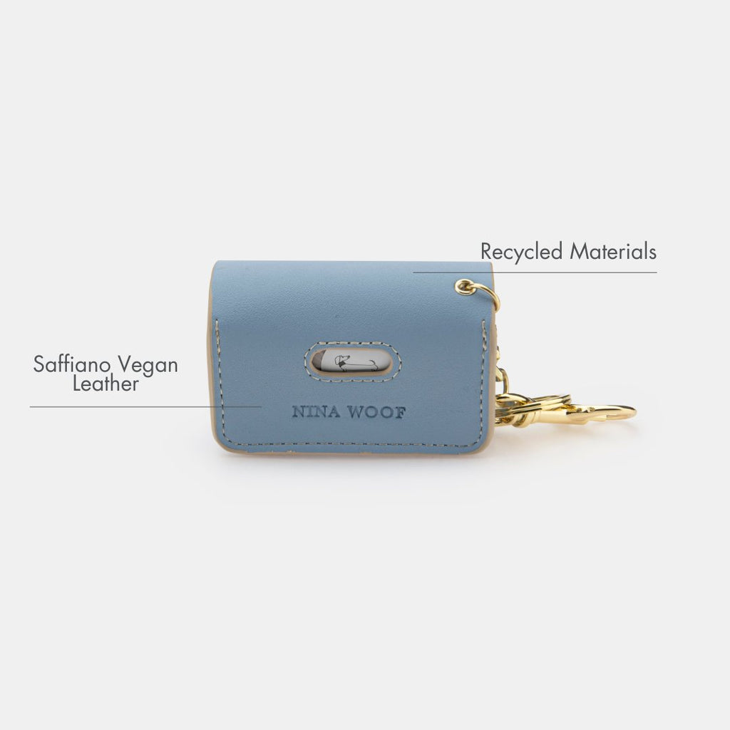 Blue vegan leather waste bag holder with snap front flap and gold keyring clip