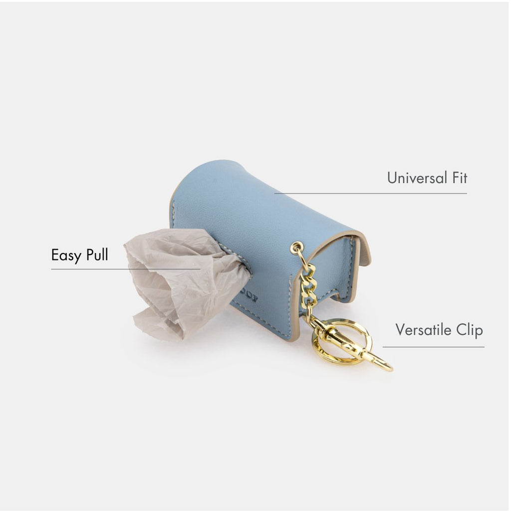 Blue waste bag dispenser showing easy-pull opening and versatile key clip
