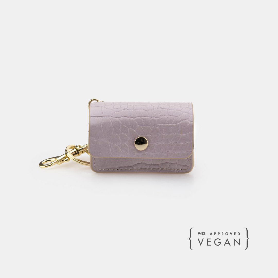 Lilac vegan leather waste bag holder with snap closure and gold keyring clip