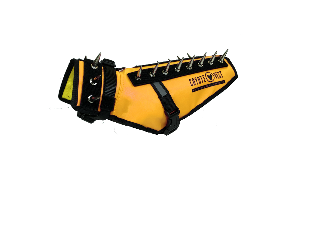 Yellow pet vest with black spikes, D-ring leash clip, and adjustable side straps